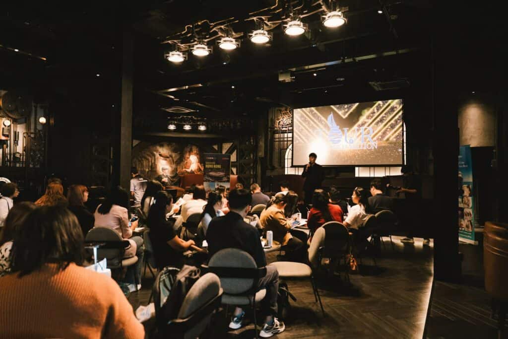 Business seminar event venue in Bangkok with presentation stage and seating for corporate guests